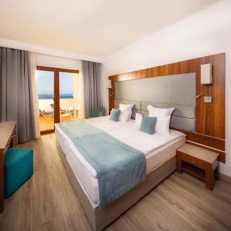 Отель Alua Helios Bay 4*